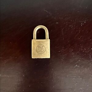 Louis Vuitton Gold Lock #228